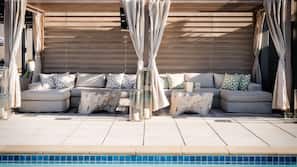 Outdoor pool, pool cabanas (surcharge), pool loungers
