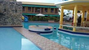 Outdoor pool, pool umbrellas, sun loungers