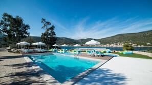 Outdoor pool, pool umbrellas, pool loungers