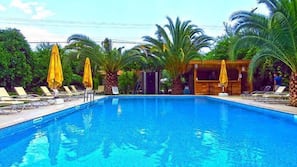 Outdoor pool, pool umbrellas, pool loungers