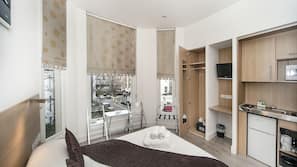 1 chambre, coffre-fort suffisamment grand pour un ordinateur portable