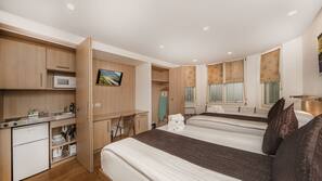 1 chambre, coffre-fort suffisamment grand pour un ordinateur portable