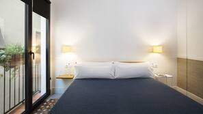 Ropa de cama de alta calidad, edredones de plumas, minibar y caja fuerte