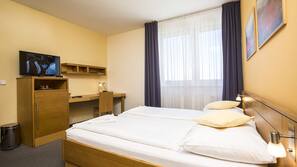 Hypo-allergenic bedding, minibar, in-room safe, desk