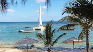 On the beach, sun loungers, scuba diving, snorkeling