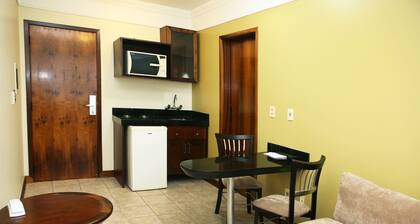 Le Village Flats Hotel e Business