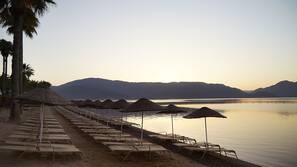 Private beach, sun-loungers, beach umbrellas