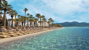 Private beach, sun-loungers, beach umbrellas