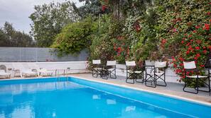 Outdoor pool, pool umbrellas, pool loungers