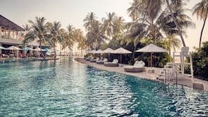 Outdoor pool, free pool cabanas, pool umbrellas