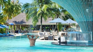 Outdoor pool, free pool cabanas, pool umbrellas