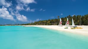 On the beach, white sand, windsurfing, beach bar