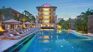 2 outdoor pools, open 7:00 AM to 10:00 PM, pool umbrellas, pool loungers