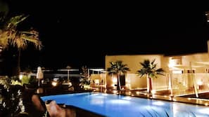 Seasonal outdoor pool, pool umbrellas, sun loungers