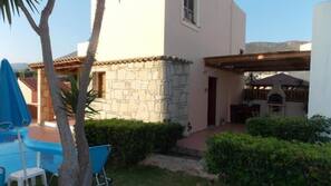 Seasonal outdoor pool, pool umbrellas, pool loungers