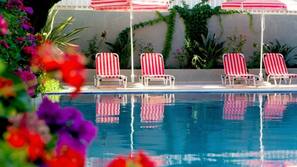 Outdoor pool, pool umbrellas, pool loungers