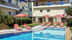 Outdoor pool, pool umbrellas, pool loungers