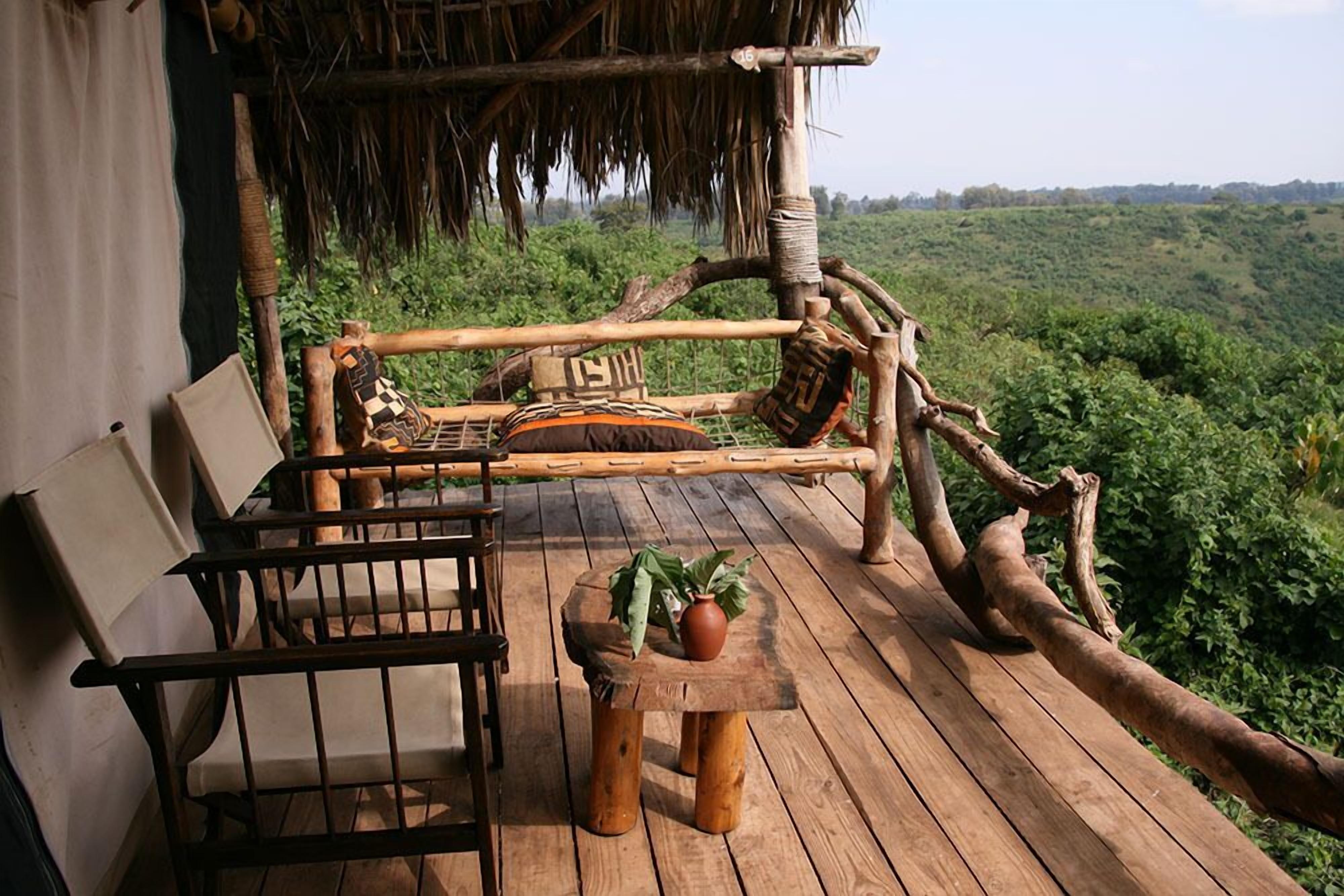 tented crater camp forest balcony