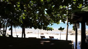 On the beach, sun-loungers, beach umbrellas, beach towels