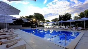 Seasonal outdoor pool, pool umbrellas, pool loungers