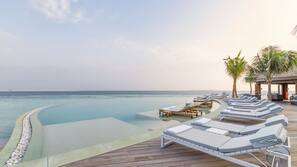 Outdoor pool, pool umbrellas, pool loungers