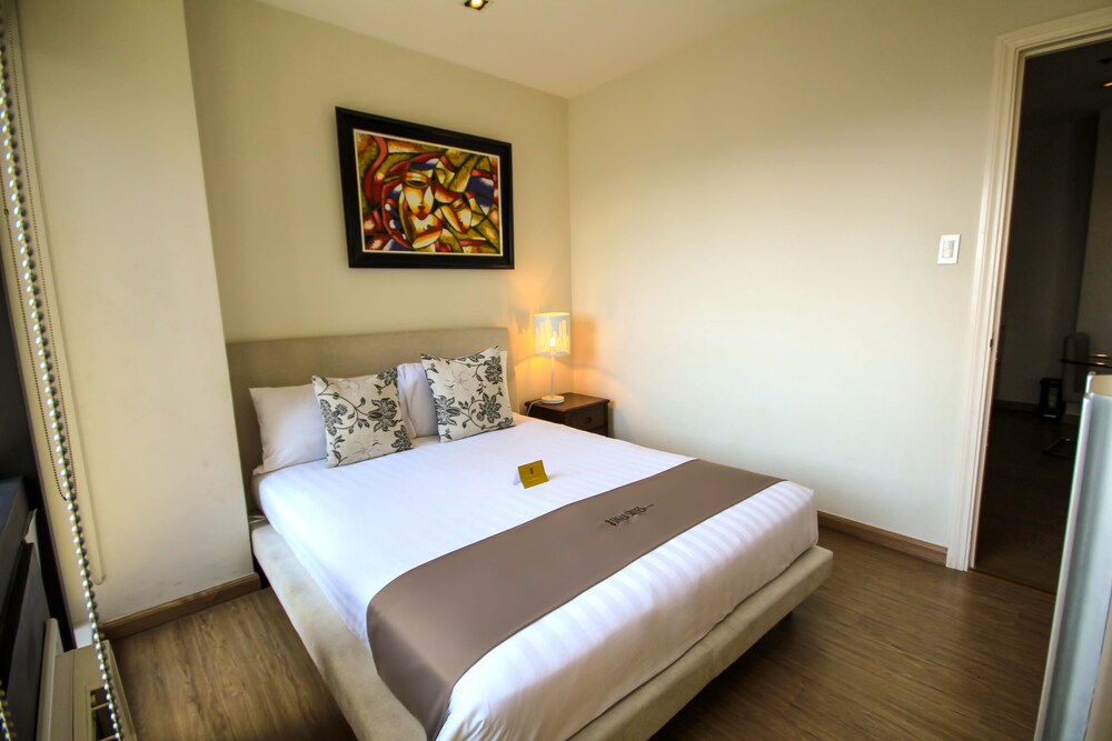 Room, Siglo Suites at The Gramercy Residences