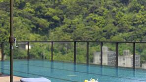 Outdoor pool, open 7 AM to 10 PM, sun loungers