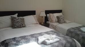 Premium bedding, desk, iron/ironing board, free WiFi