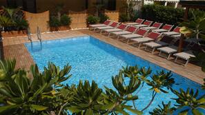 Seasonal outdoor pool, pool umbrellas, pool loungers