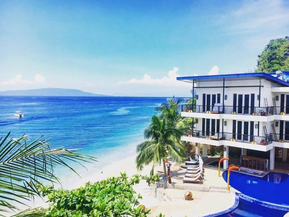 Sunset At Aninuan Beach Resort 2018 Room Prices 120 Deals Beach Ocean View Featured Image