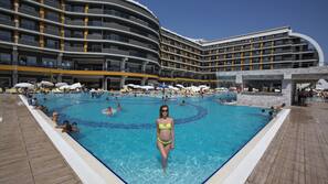 2 outdoor pools, pool umbrellas, pool loungers