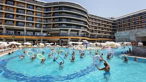 2 outdoor pools, pool umbrellas, pool loungers