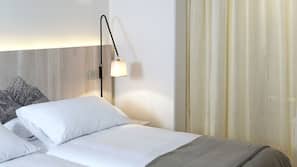 Premium bedding, pillow top beds, minibar, in-room safe