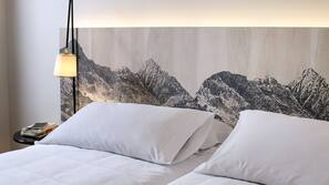 Premium bedding, pillow top beds, minibar, in-room safe