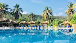 Outdoor pool, pool umbrellas, pool loungers