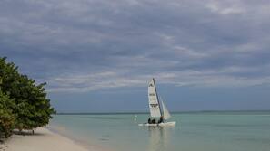 On the beach, white sand