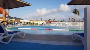 Outdoor pool, pool umbrellas, pool loungers