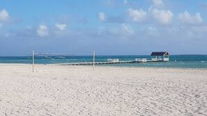 On the beach, white sand