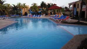 Outdoor pool, pool umbrellas, pool loungers
