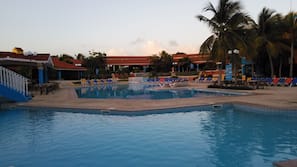 Outdoor pool, pool umbrellas, pool loungers