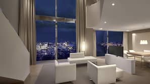 Luxe beddengoed, een minibar, een kluis op de kamer, een bureau
