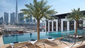 Outdoor pool, open 7:00 AM to 6:00 PM, sun loungers