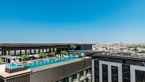 Outdoor pool, open 7:00 AM to 6:00 PM, sun loungers