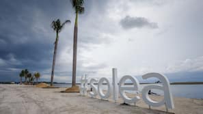 On the beach, sun-loungers, beach towels, snorkelling