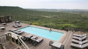 Outdoor pool, free pool cabanas, pool umbrellas