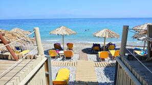 Private beach, sun-loungers, beach umbrellas, beach bar