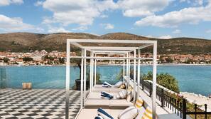 Indoor pool, seasonal outdoor pool, free pool cabanas, pool umbrellas