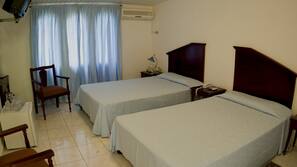 Minibar, desk, linens