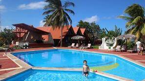 Outdoor pool, open 9:30 AM to 6:30 PM, pool umbrellas, sun loungers