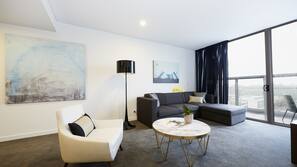 Flat-screen TV, iPod docking station, pay-per-view films